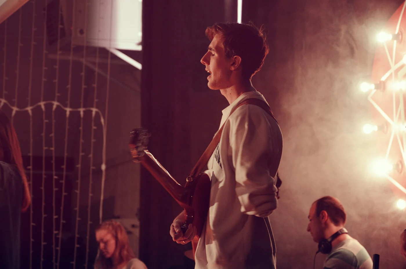 Roman playing bass on stage